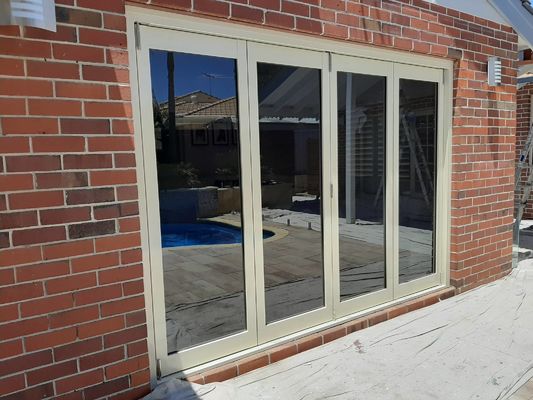Home Durable Aluminum Folding Doors With Powder Coating Frame